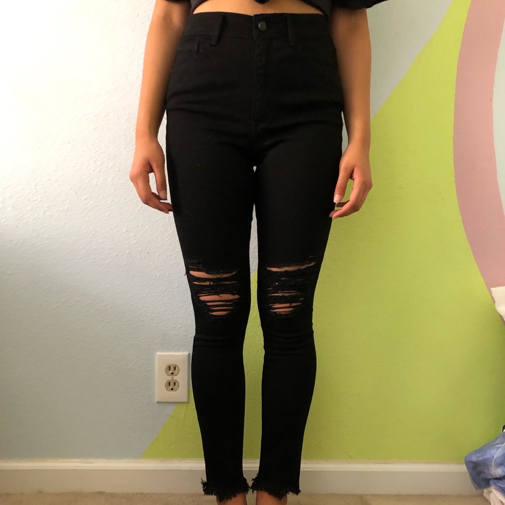 Ripped high-waisted jeans